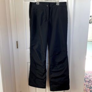 Obermeyer women’s ski pants; black, size 8. Like new! Lined with elastic hips.